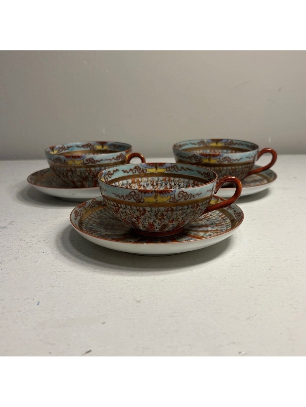 Japanese Kutani Thousand Faces Hand Painted Bonechina Teacup & Saucer Set of 3